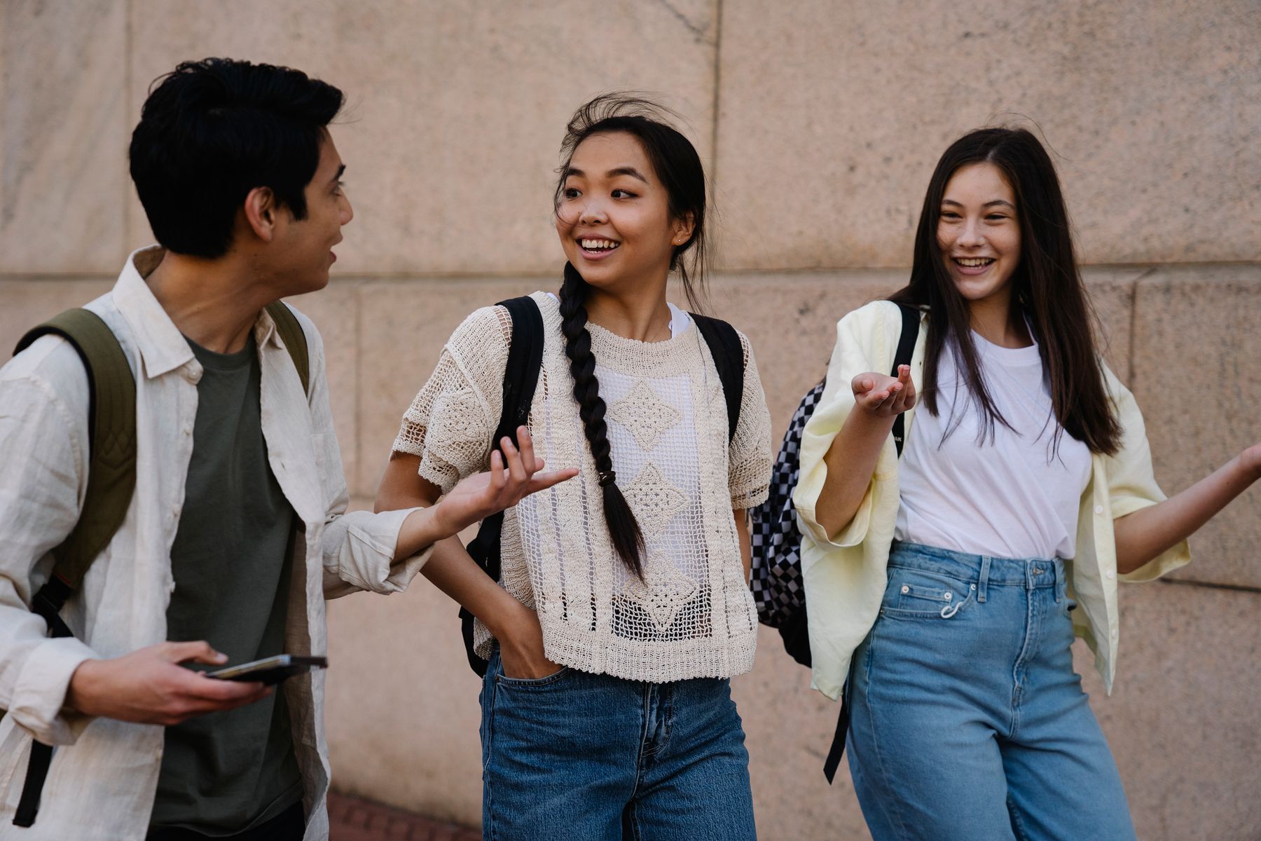 A student smiling with friends